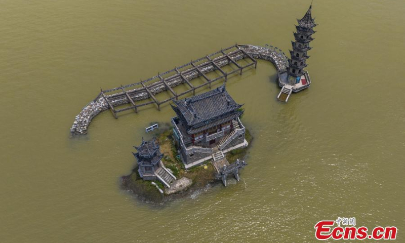 Photo shows the flooded historic site of Luoxingdun Island in Poyang Lake of Lushan City, east China's Jiangxi Province, June 25, 2022. The water level of Poyang Lake, China's biggest freshwater lake, continued to rise due to the heavy rainfall. (Photo: China News Service/Ma Gang)