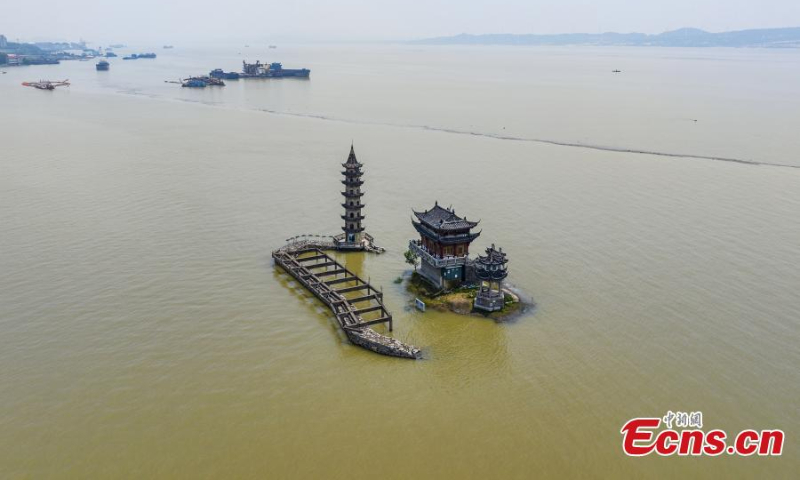 Photo shows the flooded historic site of Luoxingdun Island in Poyang Lake of Lushan City, east China's Jiangxi Province, June 25, 2022. The water level of Poyang Lake, China's biggest freshwater lake, continued to rise due to the heavy rainfall. (Photo: China News Service/Ma Gang)