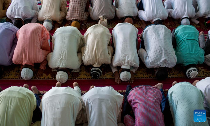 People pray during Eid al-Adha in a mosque in Kathmandu, Nepal, July 10, 2022. (Photo by Sulav Shrestha/Xinhua)