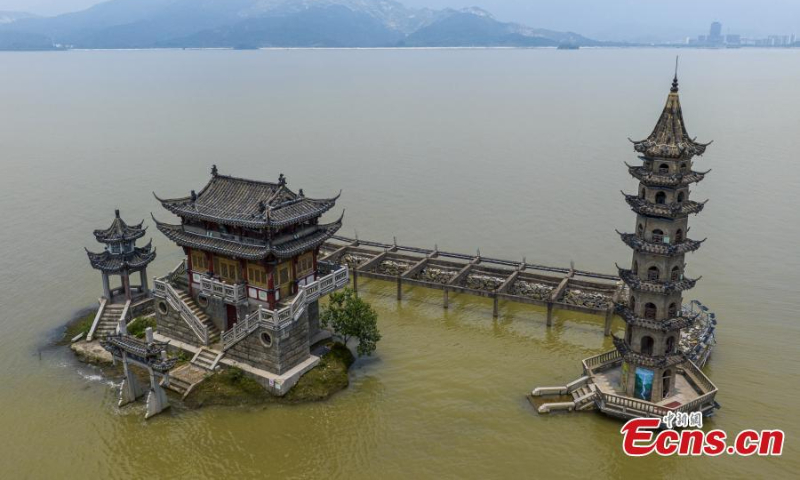 Photo shows the flooded historic site of Luoxingdun Island in Poyang Lake of Lushan City, east China's Jiangxi Province, June 25, 2022. The water level of Poyang Lake, China's biggest freshwater lake, continued to rise due to the heavy rainfall. (Photo: China News Service/Ma Gang)