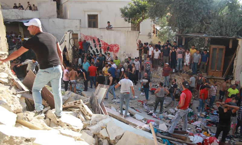 1 dead, several injured after building collapses in N. Lebanon - Global ...