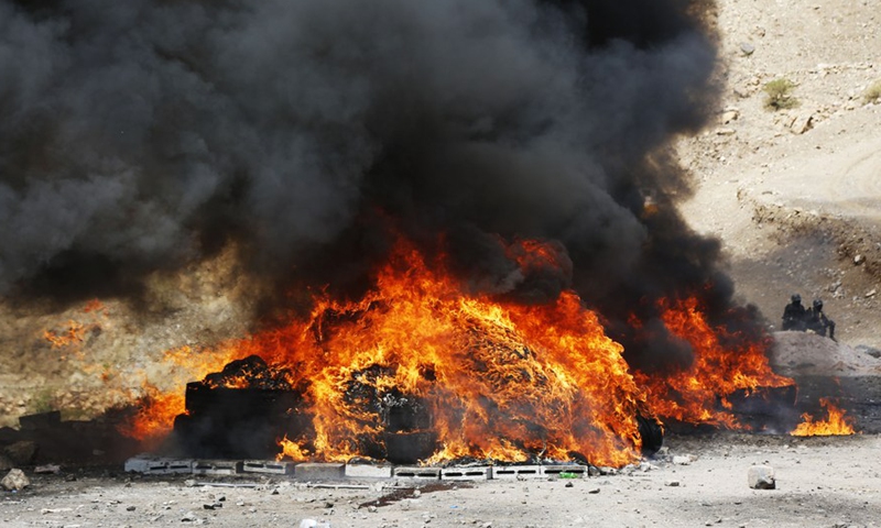 Local authorities burn a large number of illicit narcotics near Sanaa, Yemen's capital, on June 26, 2022.Photo:Xinhua