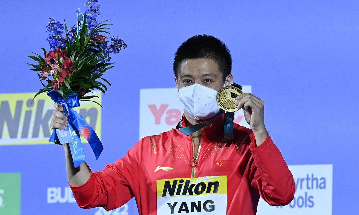 China's Yang Jian celebrates taking gold in the men's 10m platform diving finals at the Duna Arena in Budapest on July 3, 2022. Photo: VCG