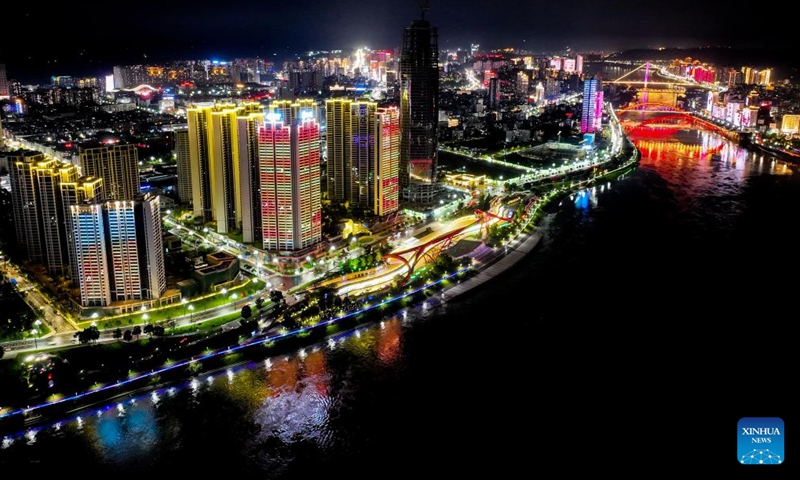 Aerial photo taken on June 30, 2022 shows the night view of Yibin, southwest China's Sichuan Province. Built on the riverside, the city of Yibin, where the Jinsha and Minjiang rivers converge into the Yangtze River, is known as the first city on the Yangtze River.(Photo: Xinhua)