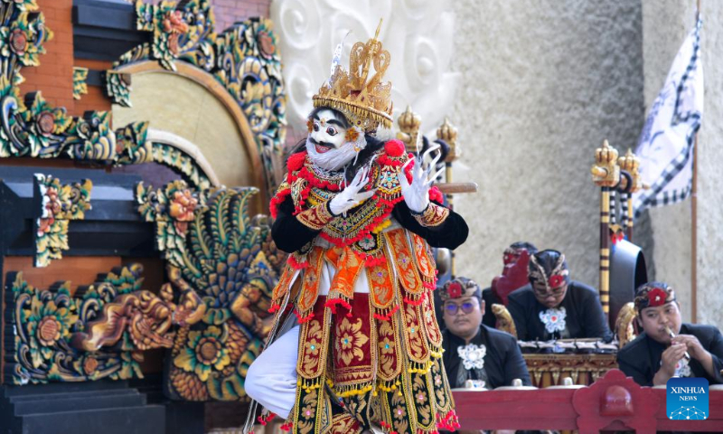 A dancer performs traditional Balinese dance in a cultural park in Bali, Indonesia, July 10, 2022. (Xinhua/Xu Qin)