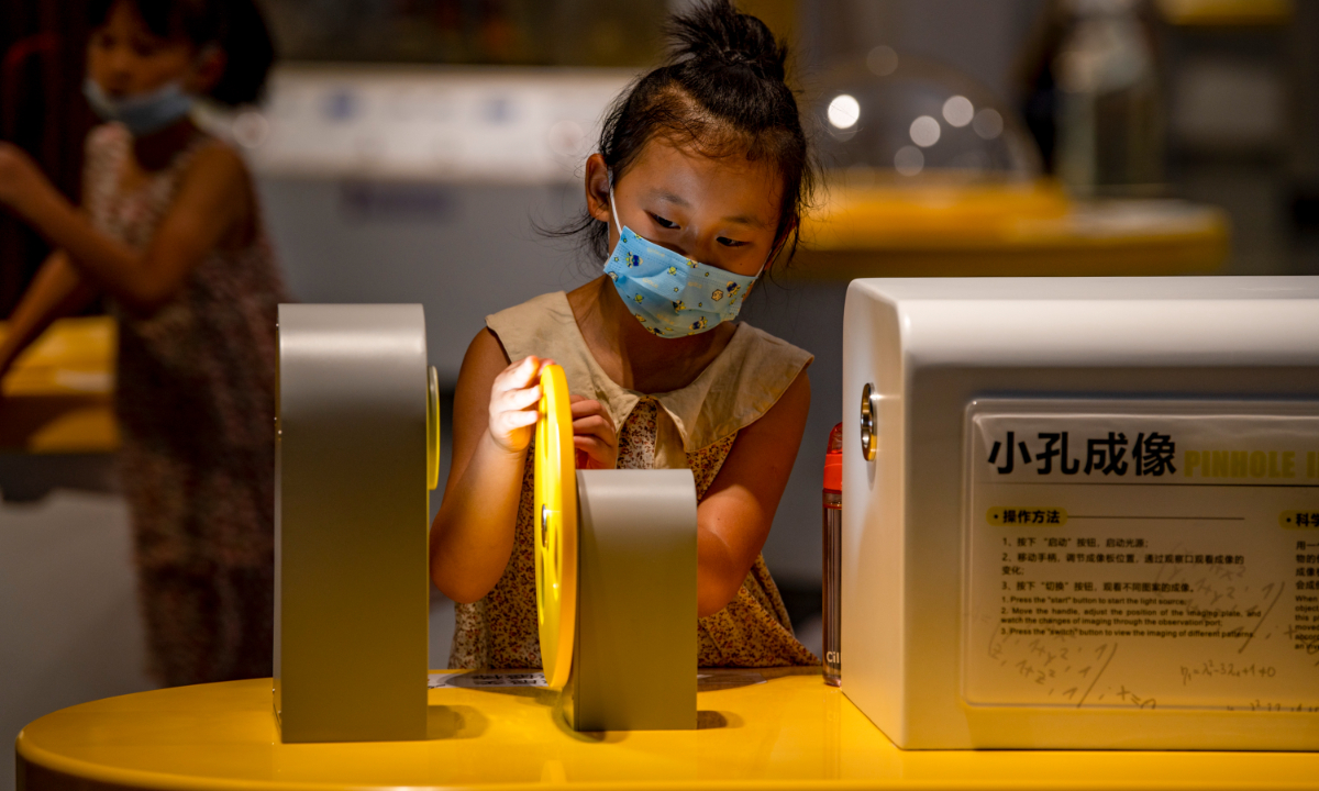 Children enjoy technology projects at a local science and technology museum in Jinhua, East China's Zhejiang Province, during the holiday on July 15, 2022. Photo: VCG
