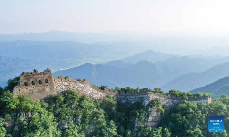 Aerial photo taken on July 10, 2022 shows the scenery of a section of the Great Wall to the west of Mutianyu section in Beijing, capital of China. (Xinhua/Chen Yehua)