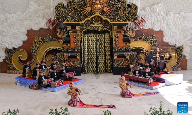 Dancers perform traditional Balinese dance in a cultural park in Bali, Indonesia, July 10, 2022. (Xinhua/Xu Qin)