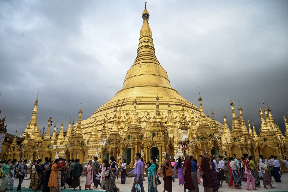 Buddhist devotees gather around the Shwedagon Pagoda during the Full Moon Day of Waso in Yangon, Myanmar on July 12, 2022. Celebrated in July throughout the country, this sacred festival is highly respected by the locals. Photo: AFP