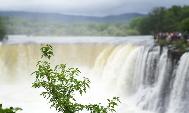 Photo taken on July 13, 2022 shows scenery of Diaoshuilou waterfall at the Jingpohu Global Geopark in Mudanjiang City, northeast China's Heilongjiang Province.Photo:Xinhua