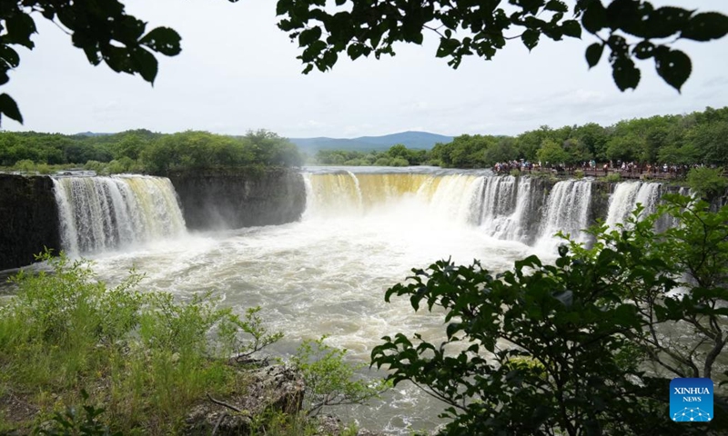 Photo taken on July 13, 2022 shows scenery of Diaoshuilou waterfall at the Jingpohu Global Geopark in Mudanjiang City, northeast China's Heilongjiang Province.Photo:Xinhua