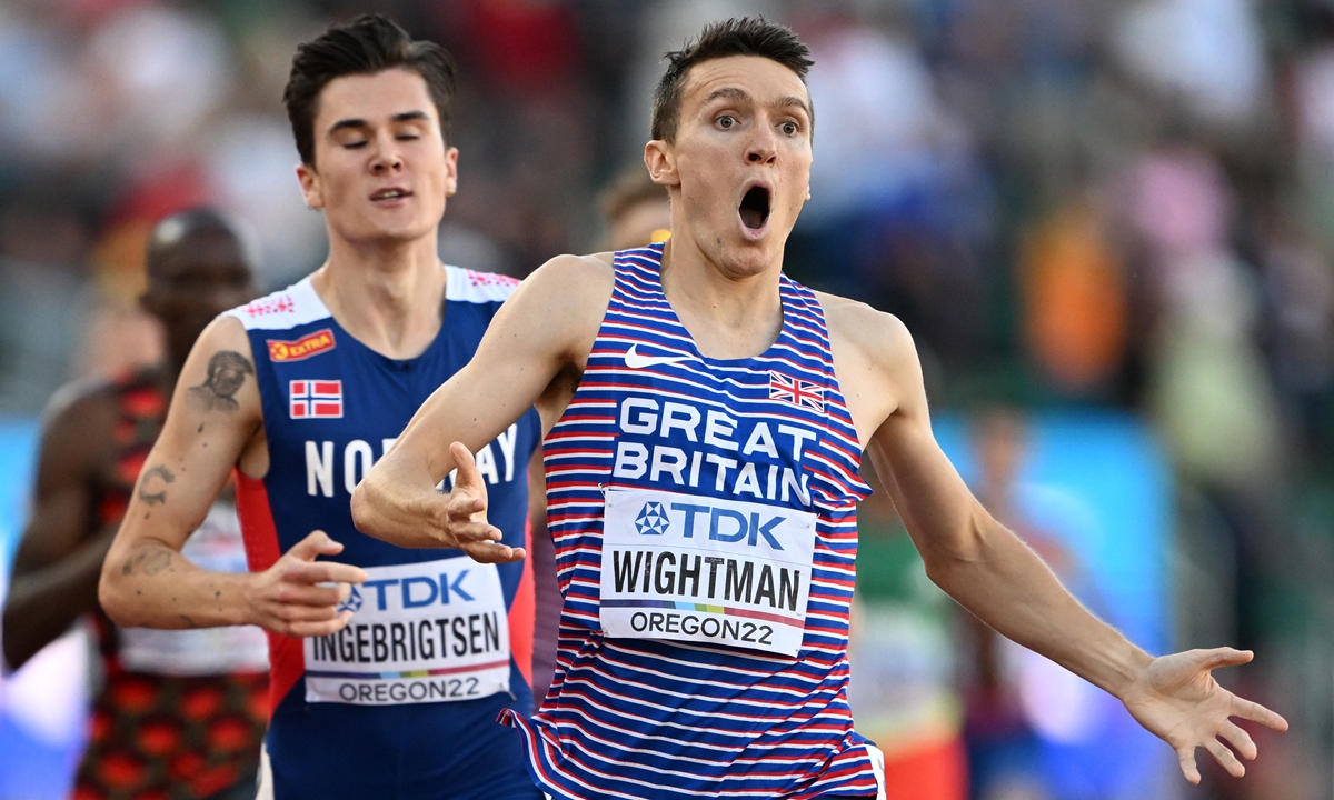 Britain's Jake Wightman reacts after winning the men's 1500-meter final during the World Athletics Championships at Hayward Field in Eugene, Oregon, the US on July 19, 2022. Photo: AFP