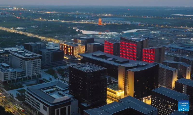 Aerial photo taken on July 20, 2022 shows a night view of the business service center in Xiong'an New Area, north China's Hebei Province. (Xinhua/Xing Guangli)