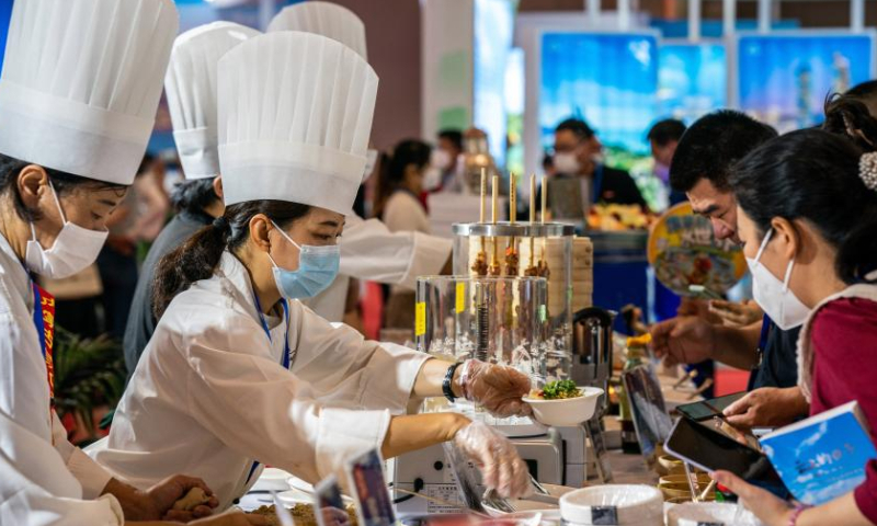 People visit the 2022 China International Travel Mart (CITM) in Kunming, southwest China's Yunnan Province, July 22, 2022. The 2022 CITM kicked off Friday in Kunming after a hiatus of one year due to the COVID-19 epidemic. Photo: Xinhua