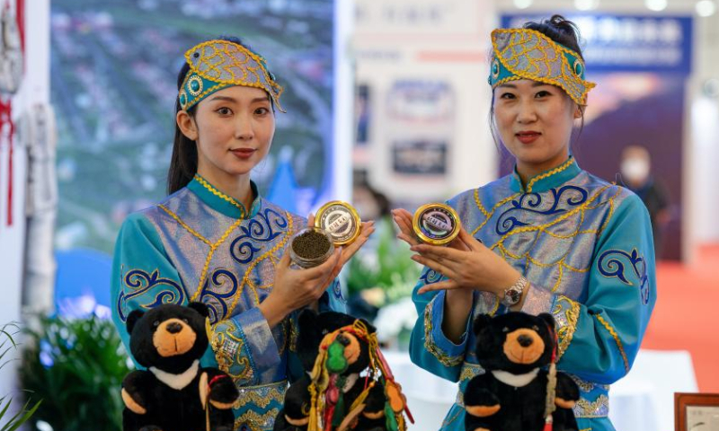 Exhibitors show their products at the 2022 China International Travel Mart (CITM) in Kunming, southwest China's Yunnan Province, July 22, 2022. The 2022 CITM kicked off Friday in Kunming after a hiatus of one year due to the COVID-19 epidemic. Photo: Xinhua