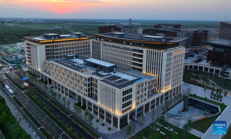 Aerial photo taken on July 20, 2022 shows a night view of the business service center in Xiong'an New Area, north China's Hebei Province. (Xinhua/Xing Guangli)