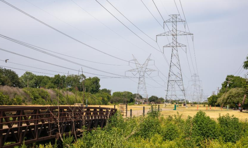 Photo taken on July 21, 2022 shows power line towers in Plano, Texas, the United States. Most parts of Texas have been experiencing extreme hot and dry weather since June. Besides causing physical discomfort and inconvenience, heat and drought has significantly strained water and power supplies in many localities. Photo: Xinhua