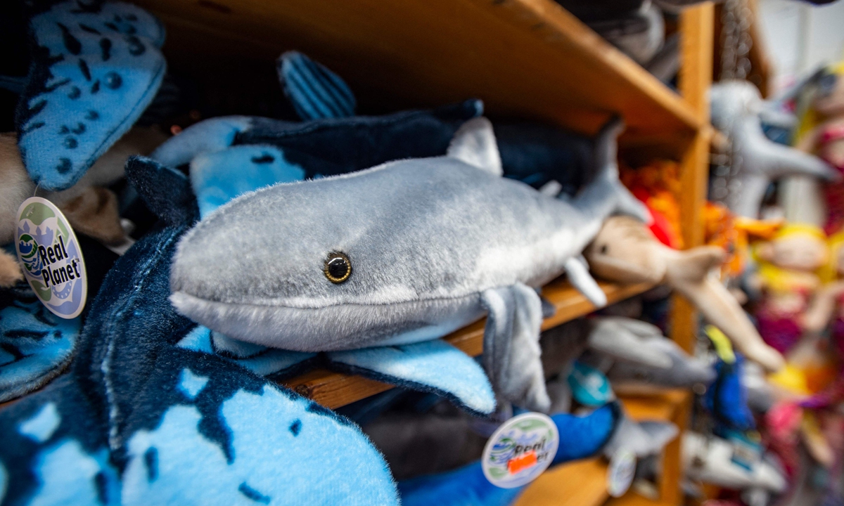 Shark-themed clothing and souvenirs are on sale at a store in Chatham, Massachusetts on July 15, 2022. Photo: VCG