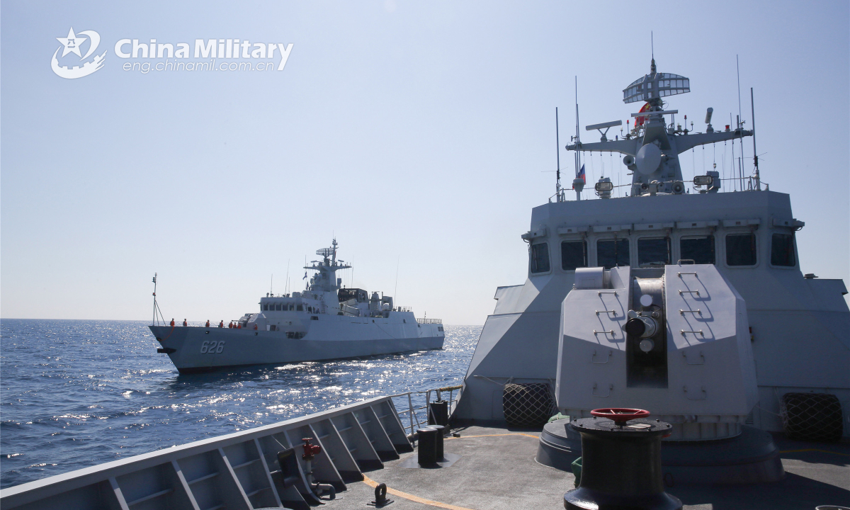 Two warships attached to a frigate flotilla of the navy under the PLA Southern Theater Command conduct collaboration training during a real combat training exercise in the mid-July, 2022. Photo:China Military