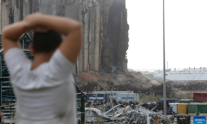 Photo taken on July 31, 2022 shows the Beirut port grain silos after its northern part collapsed in Beirut, Lebanon. The northern part of the Beirut port grain silos collapsed on Sunday after being on fire for weeks, causing a huge cloud of dust, the National News Agency reported.  Photo: Xinhua