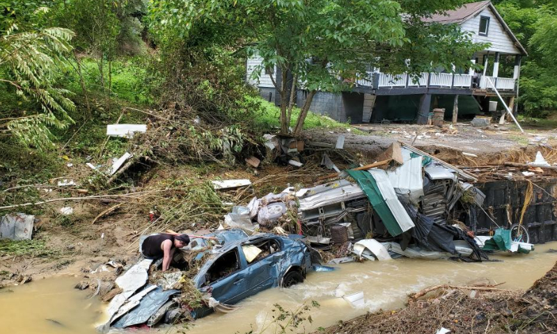 Photo taken on July 30, 2022 shows a house and vehicles destroyed by heavy rain-caused flooding in Central Appalachia in Kentucky, the United States. The death toll from the heavy rain-caused flooding hitting eastern Kentucky rose to at least 25, including four children from one family, Kentucky Governor Andy Beshear confirmed Saturday.  Photo: Xinhua