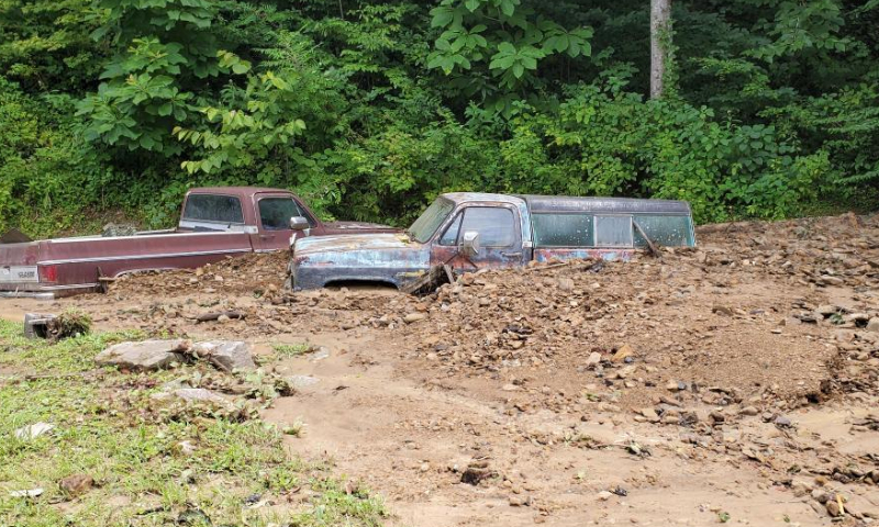 Photo taken on July 30, 2022 shows vehicles destroyed by heavy rain-caused flooding in Central Appalachia in Kentucky, the United States. The death toll from the heavy rain-caused flooding hitting eastern Kentucky rose to at least 25, including four children from one family, Kentucky Governor Andy Beshear confirmed Saturday.  Photo: Xinhua