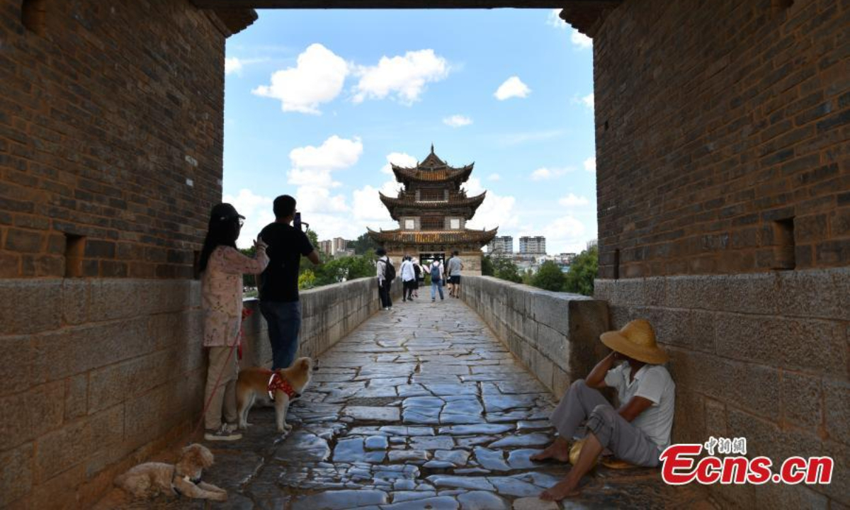 The Shuanglong Bridge(Double Dragon Bridge), 148 meters long and about 9 meters high, is among the best large-scaled ancient bridges in China. It was built as a three-arch stone bridge in the Qianlong reign(1735-1796) of the Qing Dynasty and became a seventeen-arch bridge in Daoguang reign(1820-1850) in Jiangshui county of Honghe Hani and Yi Autonomous Prefecture, southwest China's Yunnan Province. It was reconstructed in 1898 when a triple-eave square pavilion was built upright in its middle. Photo:China News Service