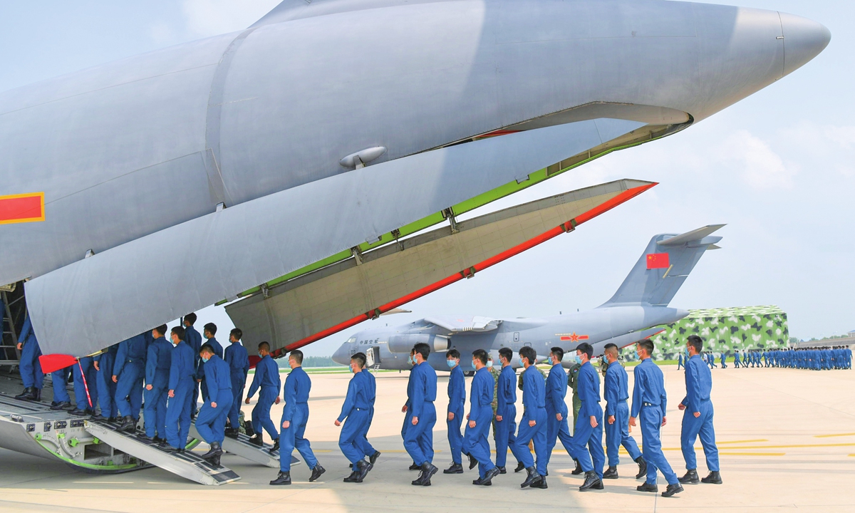 Two Y-20 transport military aircrafts arrive at a military airport on Sunday for the mission of transporting newly recruited military pilot cadets to apply to the Aviation University of Air Force. This is the first time that the People's Liberation Army Air Force uses Y-20s for this purpose. Photo: VCG