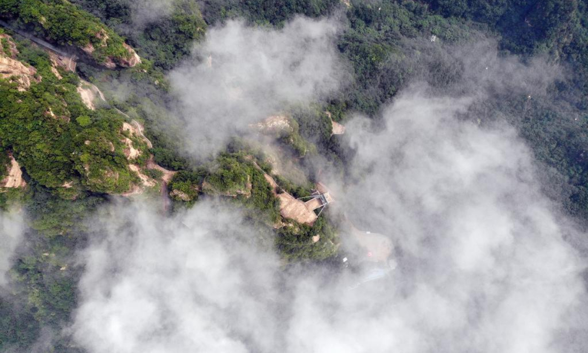 Aerial photo taken on Aug. 4, 2022 shows the mist-shrouded Xinglong Mountain in Chengde City, north China's Hebei Province. Photo:Xinhua