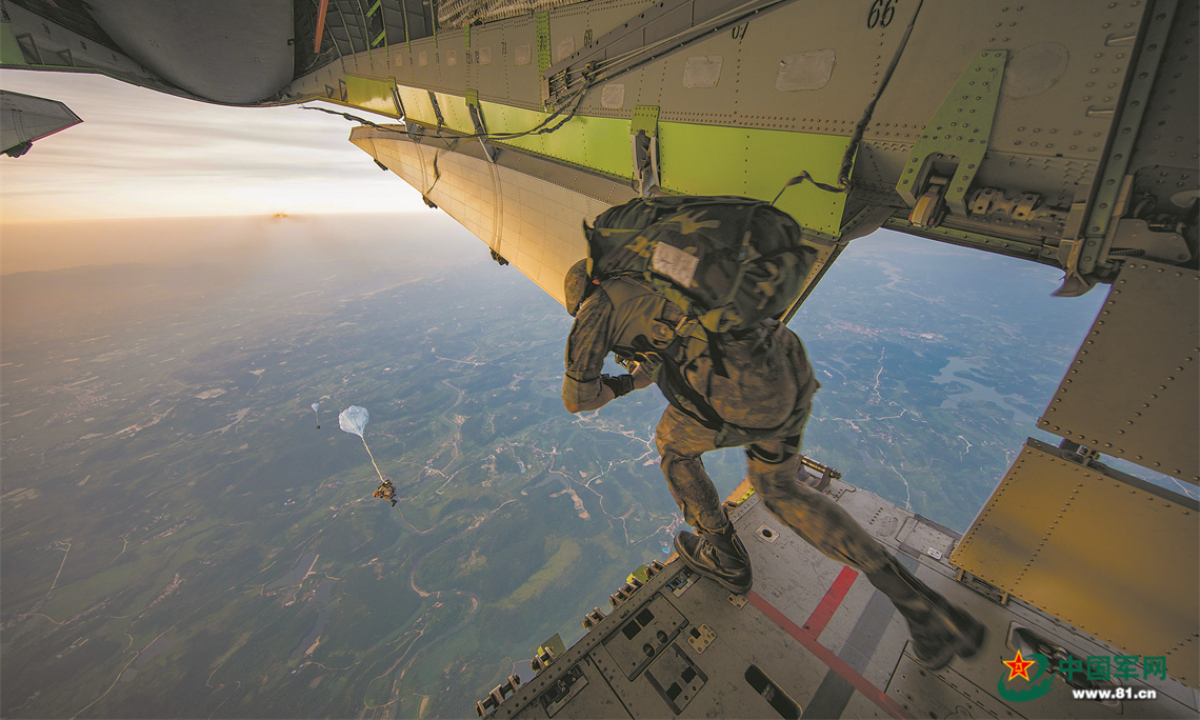 A special operations soldier assigned to the Thunder Commando of the PLA Air Force airborne troops jumps out of the aircraft during a parachuting training exercise in mid-summer, 2022. The exercise, lasting for several days, aims to hone the troops' combat capabilities in parachuting, long-range penetration and precision strike operations in the complex environment. Photo:China Military