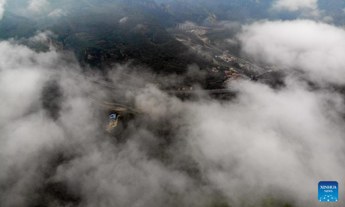 Aerial photo taken on Aug. 4, 2022 shows the mist-shrouded Xinglong Mountain in Chengde City, north China's Hebei Province. Photo:Xinhua