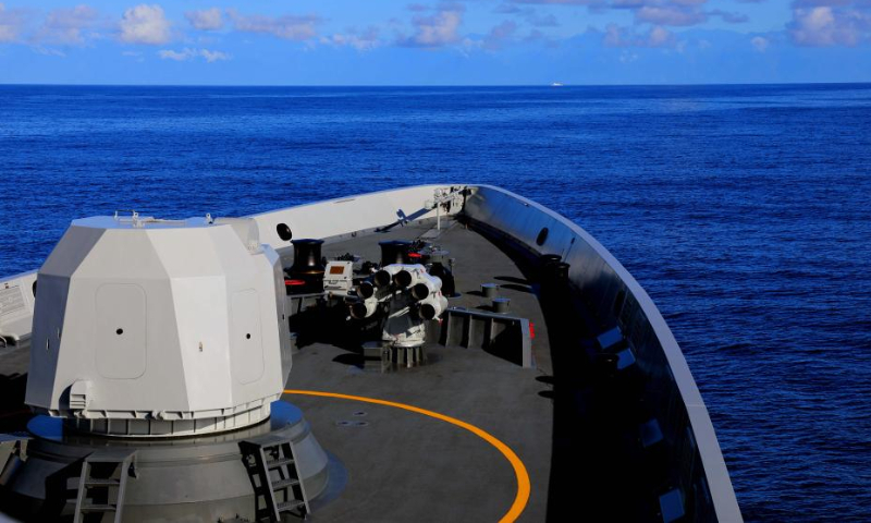 A warship of the navy of the Eastern Theater Command of the Chinese People's Liberation Army (PLA) conducts operations during joint combat exercises and training around the Taiwan Island, Aug. 6, 2022. The Command continued its joint combat exercises and training as scheduled on Saturday in the waters and airspace around the Taiwan Island. The Command tested its capabilities for striking targets on land and sea with the support of an integrated military system. Photo: Xinhua