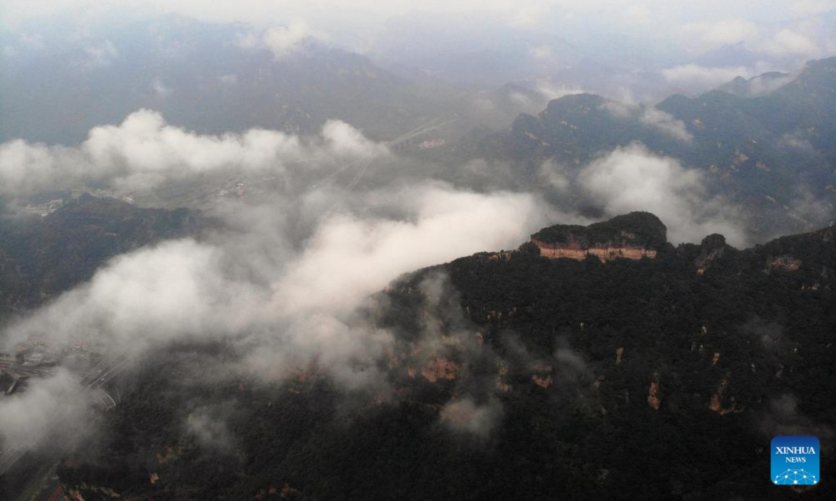 Aerial photo taken on Aug. 4, 2022 shows the mist-shrouded Xinglong Mountain in Chengde City, north China's Hebei Province. Photo:Xinhua