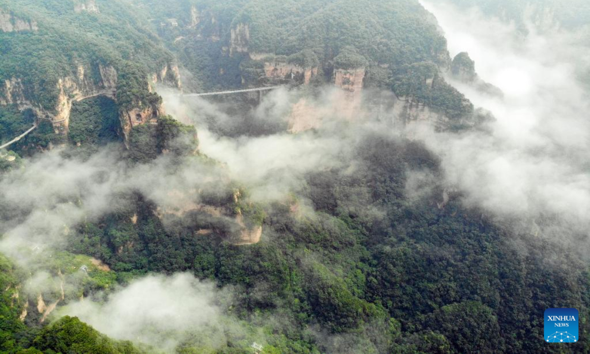 Aerial photo taken on Aug. 4, 2022 shows the mist-shrouded Xinglong Mountain in Chengde City, north China's Hebei Province. Photo:Xinhua