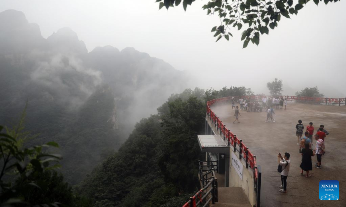 Aerial photo taken on Aug. 4, 2022 shows the mist-shrouded Xinglong Mountain in Chengde City, north China's Hebei Province. Photo:Xinhua