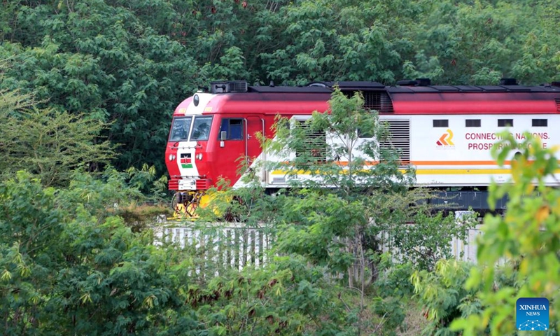 A freight train runs on the Mombasa-Nairobi Railway track in Mombasa, Kenya, on July 27, 2022. The Chinese-built Mombasa-Nairobi Standard Gauge Railway (SGR) has just celebrated its fifth anniversary of safe operation. The Mombasa-Nairobi Railway passes through nature reserves such as the Nairobi National Park and Tsavo National Park.(Photo: Xinhua)