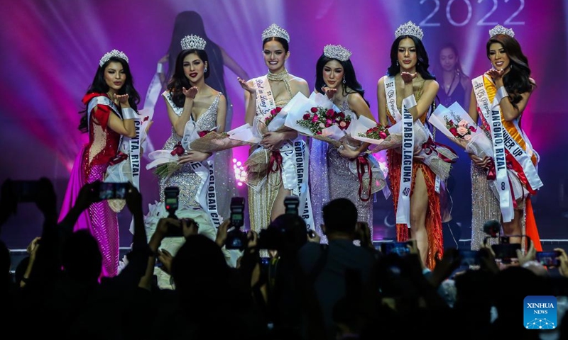 Newly crowned Binibining Pilipinas (Miss Philippines) 2022 winners, 2nd runner-up Stacey Daniella Gabriel (1st L), Binibining Pilipinas Globe Chelsea Fernandez (2nd L), Binibining Pilipinas Intercontinental Gabrielle Camille Basiano (3rd L), Binibining Pilipinas International Nicole Borromeo (3rd R), Binibining Pilipinas Grand International Roberta Angela Tamondong (2nd R), and 1st runner-up Nicole Budol (1st R) pose on stage during the grand coronation night in Quezon City, the Philippines, July 31, 2022.(Photo: Xinhua)