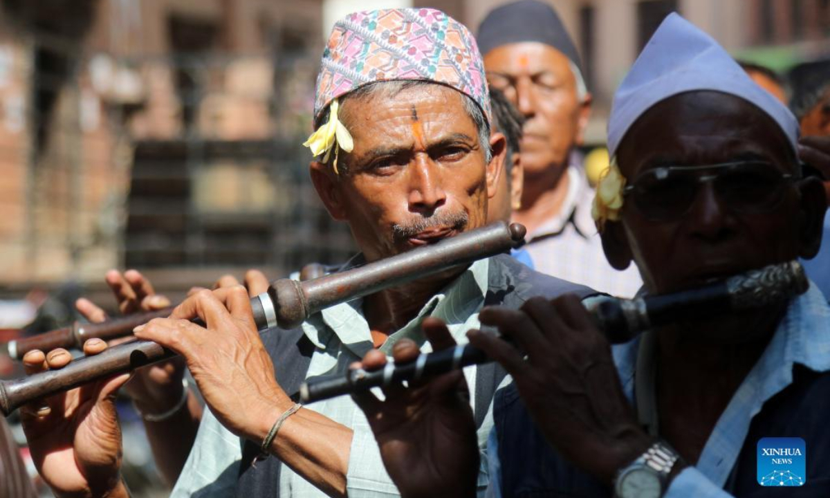 People take part in a parade during the Krishna Janmashtami festival in Bhaktapur, Nepal, Aug 19, 2022. Krishna Janmashtami festival is celebrated annually to mark the birth anniversary of Hindu God Krishna. Photo:Xinhua