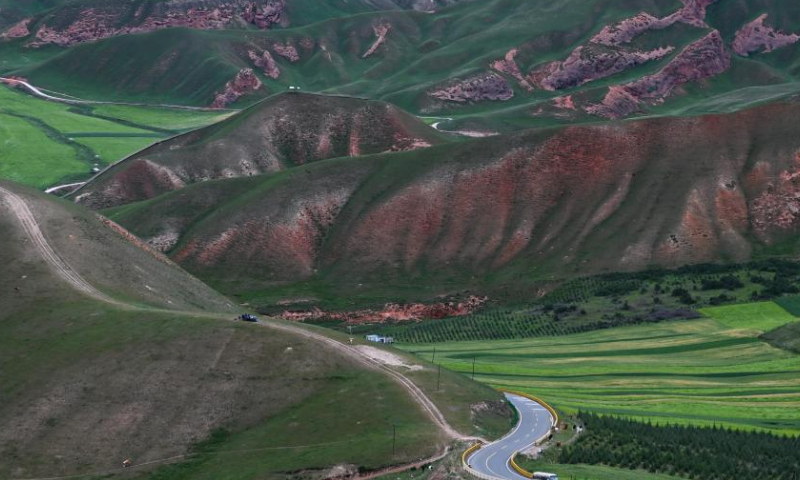 Photo taken on Aug. 10, 2022 shows a scenery of Qilian County in Haibei Tibetan Autonomous Prefecture, northwest China's Qinghai Province. (Xinhua/Zhang Long)