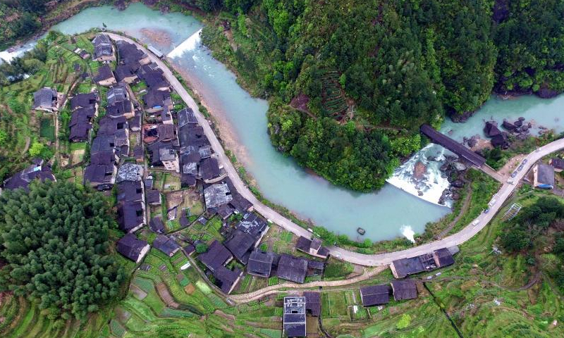 File photo shows the Luofeng wooden-roofed arch bridge in Xiadang town of Shouning county in Ningde, east China's Fujian Province. (Photo: China News Service/Wang Dongming)