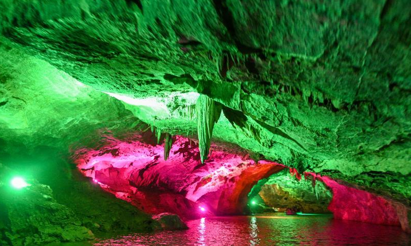Colored lights illuminate the geological formations at the Benxi Water Cave, a large-scale underground karst, in Benxi, northeast China's Liaoning Province, Aug. 10, 2022. (Photo: China News Service/Yu Haiyang)

Developed about 500,000 years ago, the cave has more than 400,000 cubic meters internal space and a total length of 5,800 meters. Comprising a dry cave and a water cave, it is the world's longest underground karst cave with water.