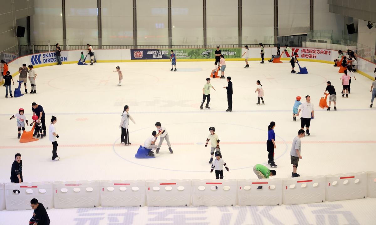 People skate at a large indoor ice rink in Nantong, East China's Jiangsu Province on July 23, 2022. Photo: VCG