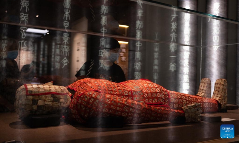 Visitors view an exhibit at the China Maritime Museum in Lingang new area of the China (Shanghai) Pilot Free Trade Zone in east China's Shanghai, Aug. 20, 2022. Saturday marked the 3rd anniversary of the launching of Lingang new area. (Xinhua/Jin Liwang)