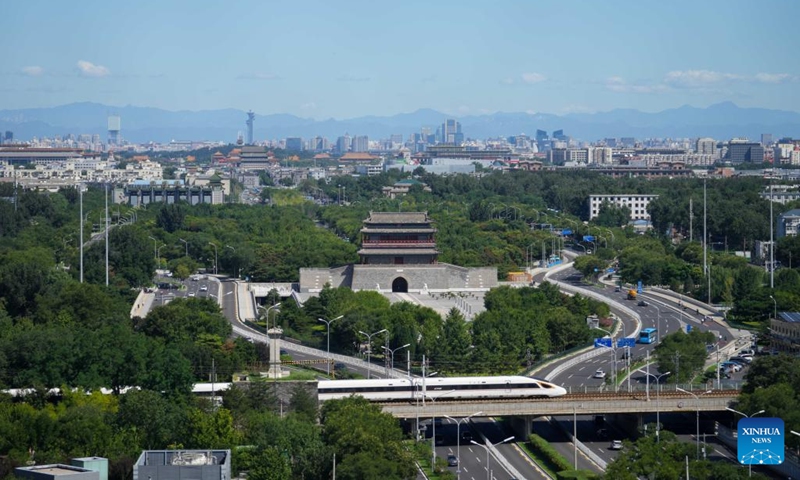 A bullet train passes by the Yongdingmen (Gate of Perpetual Peace) in Beijing, capital of China, Aug. 16, 2022.(Photo: Xinhua)