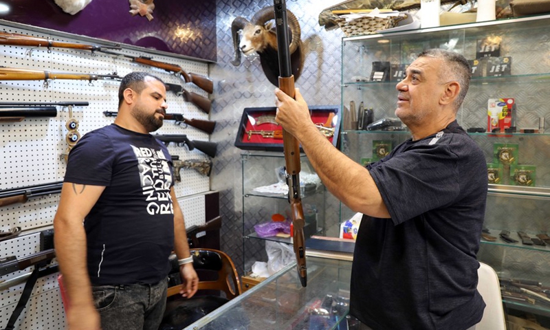 A shop sells firearms and hunting rifles in the Mansour district of western Baghdad. (Photo: Xinhua)