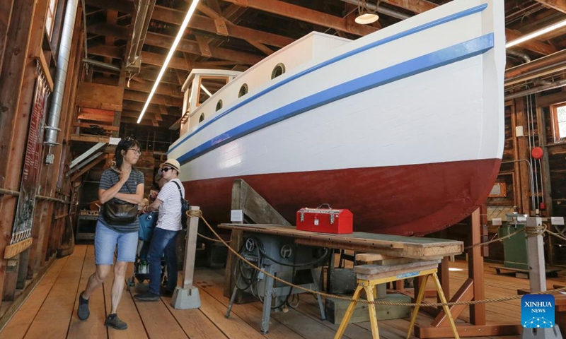 People visit a boat building facility during the 19th annual Richmond Maritime Festival in Richmond, British Columbia, Canada, on Aug. 20, 2022.Photo:Xinhua