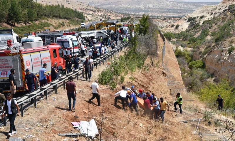 People work at the site of a traffic accident on a highway in Gaziantep province, Türkiye, on Aug. 20, 2022.Photo:Xinhua