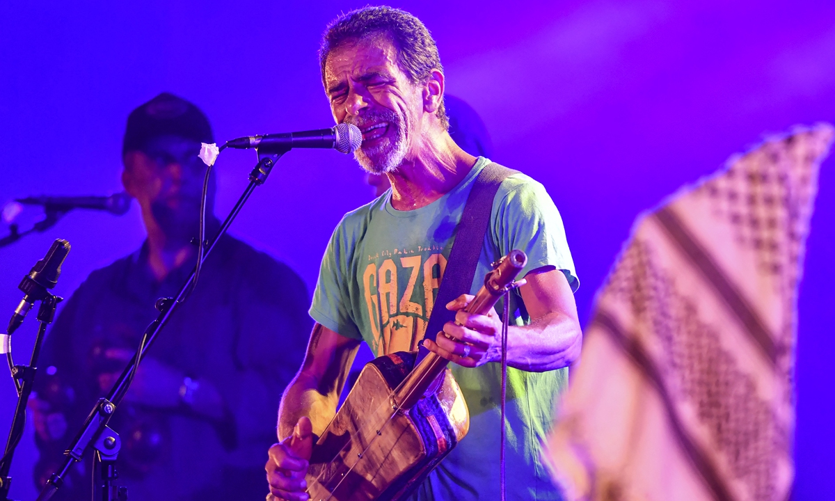 Algerian singer Nedjim Bouizzoul performs at the Roman theater of Carthage during the 56th edition of the International Festival of Carthage on August 5, 2022. Photos: AFP Algerian singer Amazigh Kateb performs at the Roman theater of Carthage on August 5, 2022.