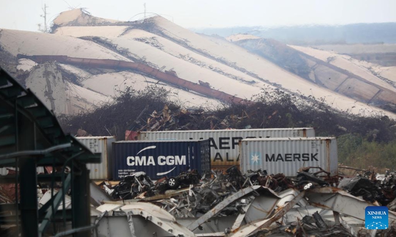 Photo taken on Aug. 24, 2022 shows the collapsed northern part of the silos in Beirut port in Beirut, Lebanon. The northern part of the silos in Beirut port in the Lebanese capital collapsed entirely on Tuesday early morning, causing a massive cloud of dust.(Photo: Xinhua)