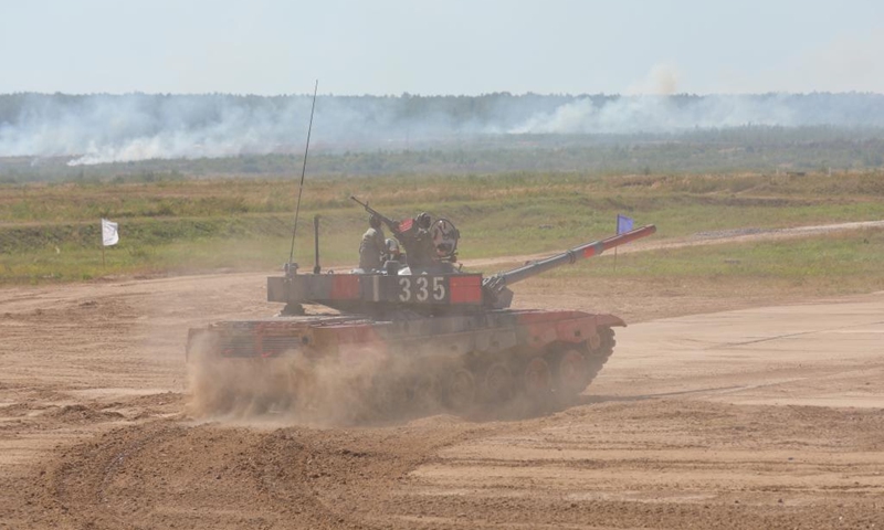 The Chinese team takes part in the tank biathlon of the International Army Games 2022 at the Alabino training ground in the Moscow region, Russia, Aug. 24, 2022. The Chinese team on Wednesday advanced to the tank biathlon's final contest in the ongoing International Army Games 2022 held in Russia.(Photo: Xinhua)